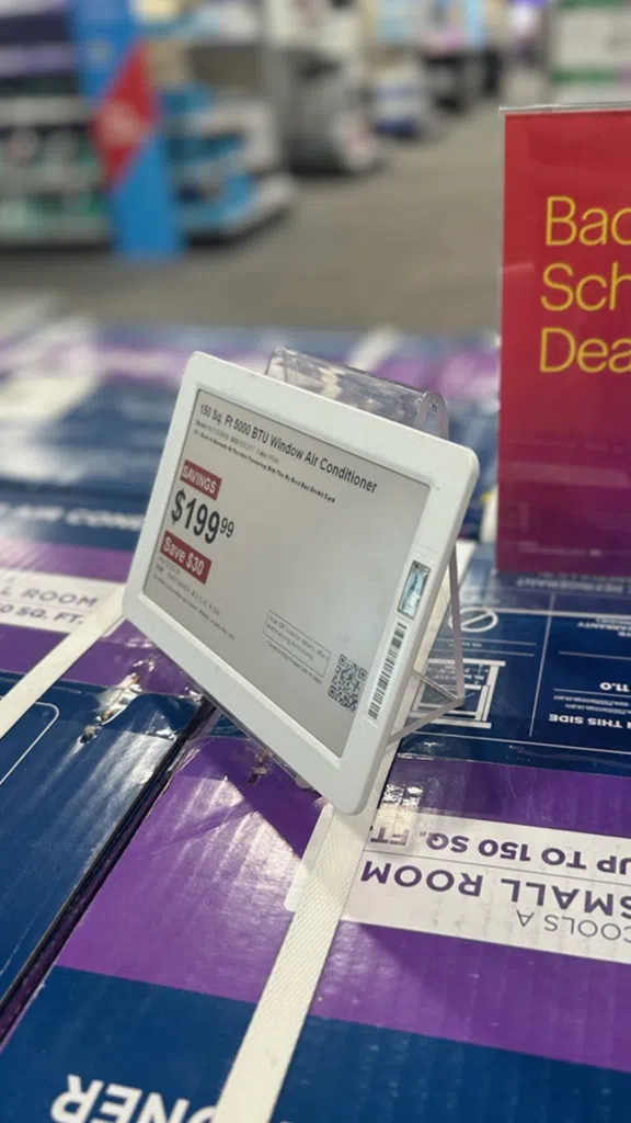 Best Buy Electronic Price Tag Holder | BAW Plastics Inc. | BAW Plastics Inc. Price tag for a window air conditioner on a store display showing 9.99 (savings) text on the label.