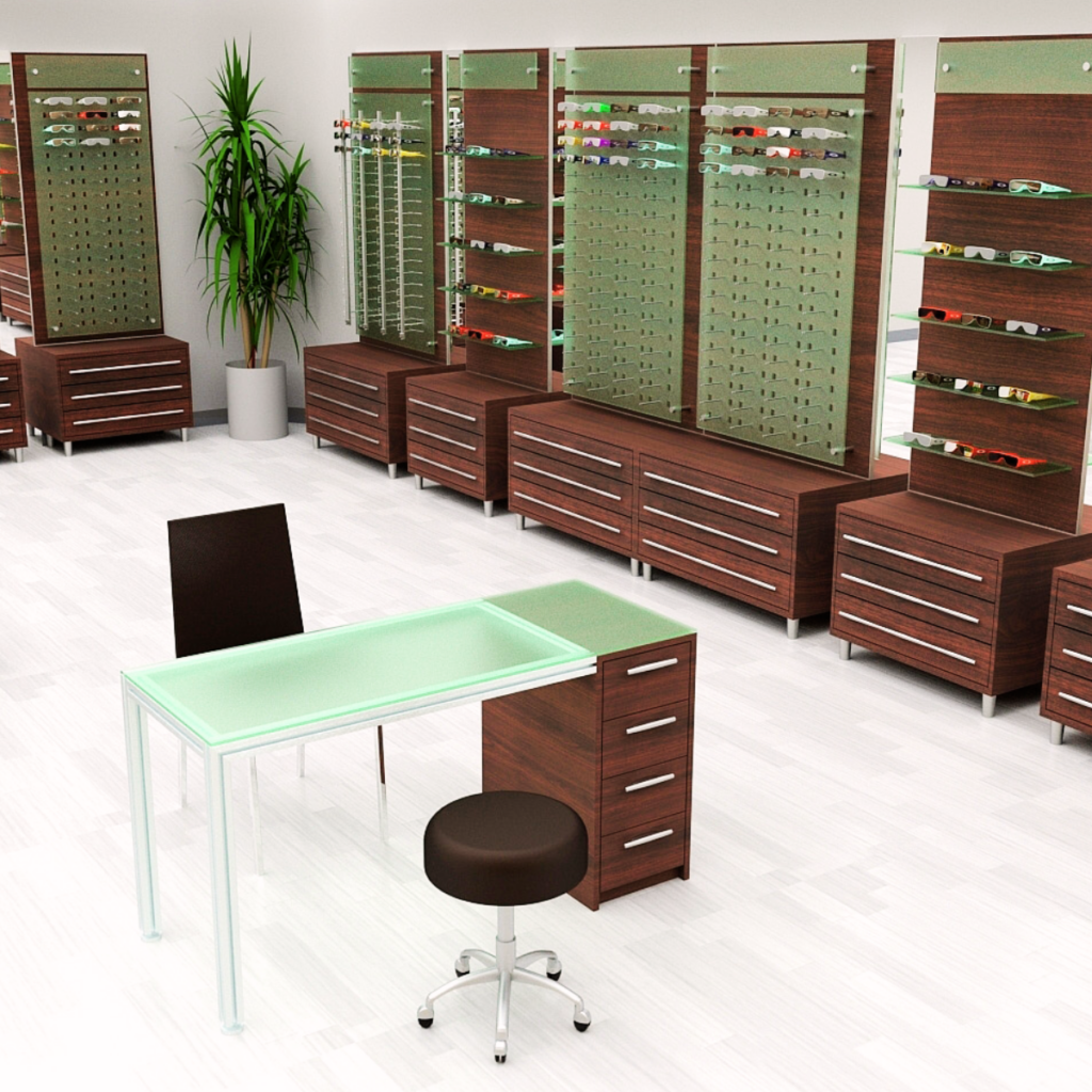 Eye Glass Wooden Displays | BAW Plastics Inc. | BAW Plastics Inc. Eyewear store interior with wall displays of sunglasses, wooden dressers, and a glass-top desk in the foreground.